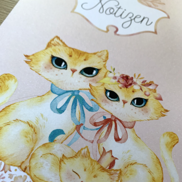 Notizbuch mit Katzenfamilie
