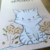 Notizbuch mit niedlichem Tigerkätzchen