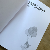 Notizbuch mit niedlichem Tigerkätzchen